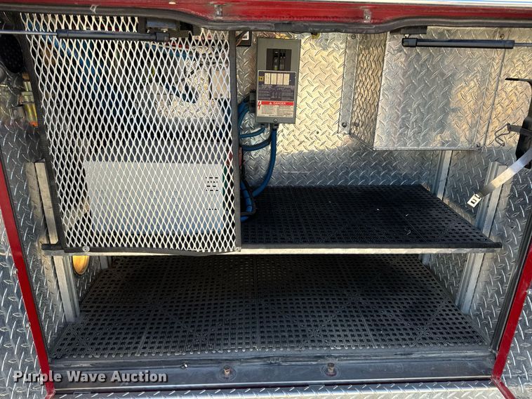 image for item EN5117 2000 Freightliner FL50 ambulance