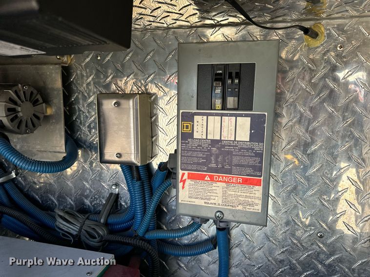 image for item EN5117 2000 Freightliner FL50 ambulance