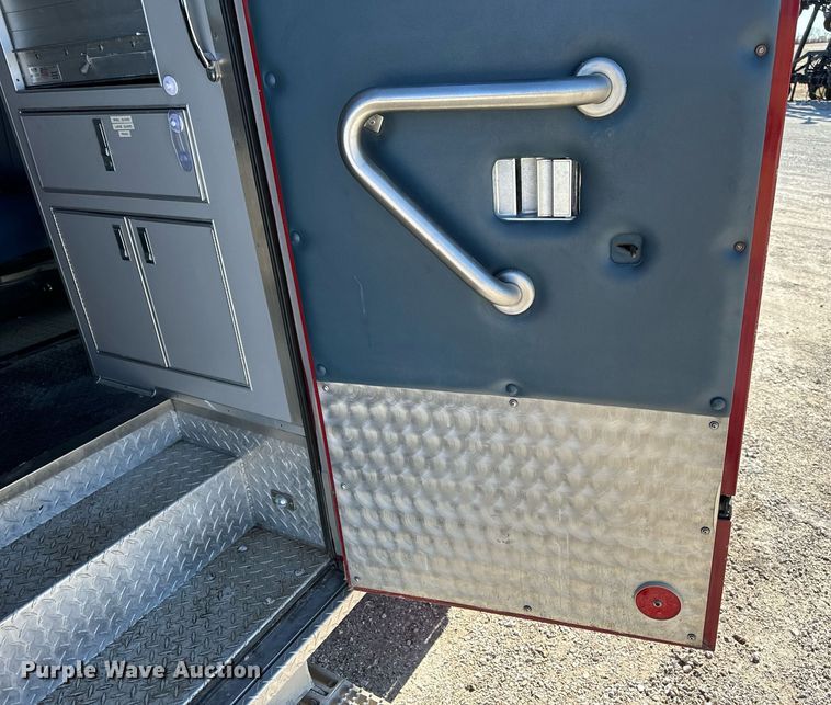 image for item EN5117 2000 Freightliner FL50 ambulance