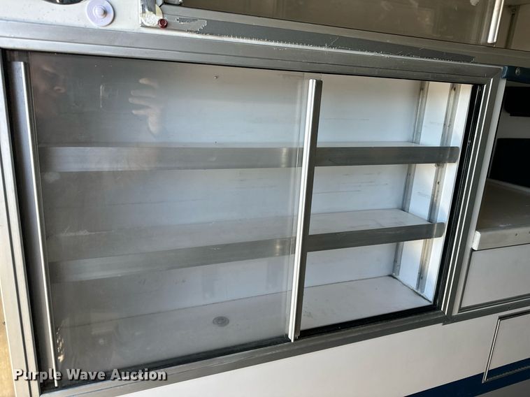 image for item EN5117 2000 Freightliner FL50 ambulance