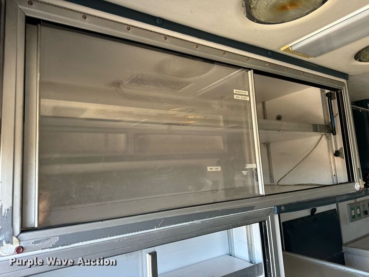 image for item EN5117 2000 Freightliner FL50 ambulance