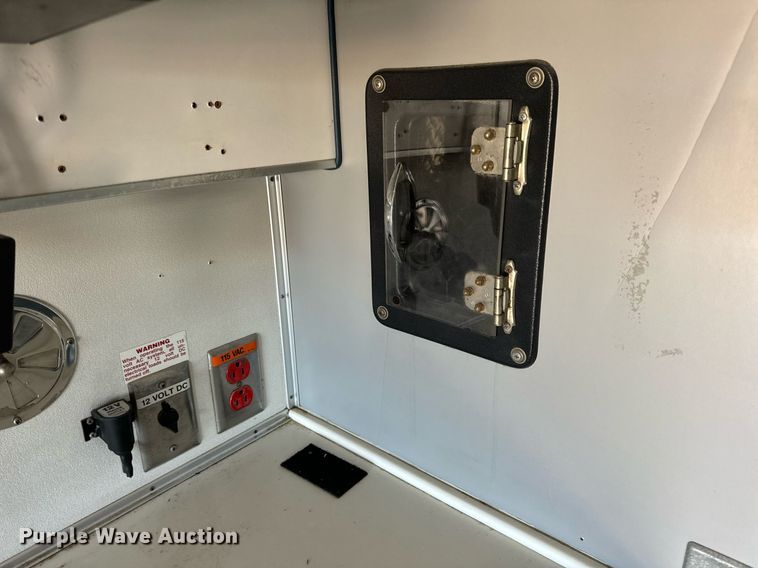 image for item EN5117 2000 Freightliner FL50 ambulance