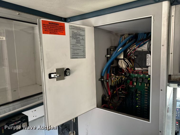 image for item EN5117 2000 Freightliner FL50 ambulance