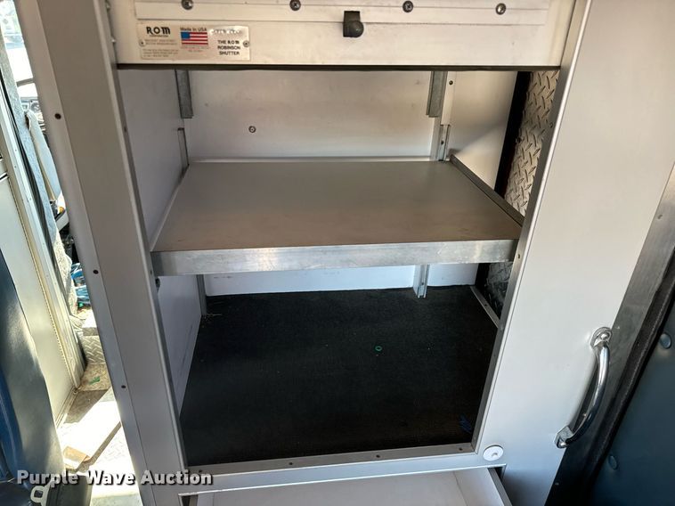 image for item EN5117 2000 Freightliner FL50 ambulance