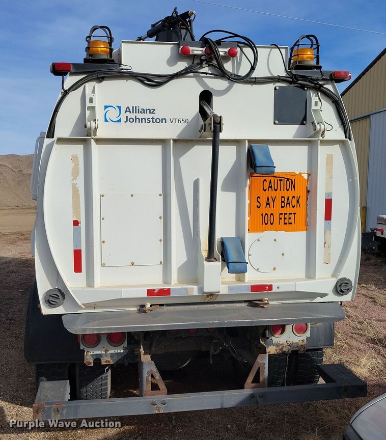 image for item NB9863 2003 Freightliner Johnston FC-70 street sweeper truck