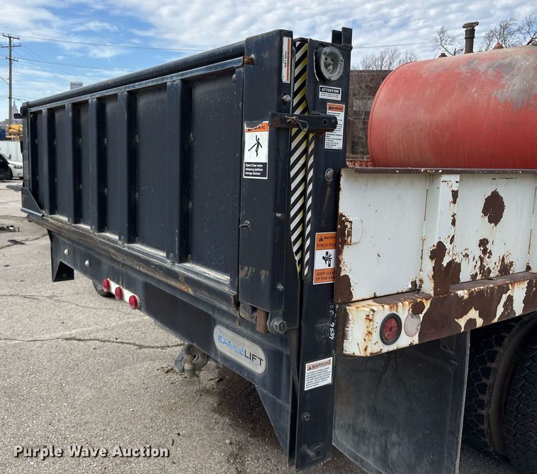 image for item NO9720 1999 International 4700 flatbed truck