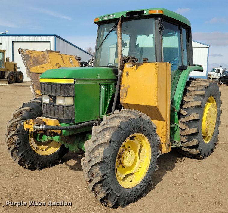 image for item DN3703 1999 John Deere  6210 MFWD tractor