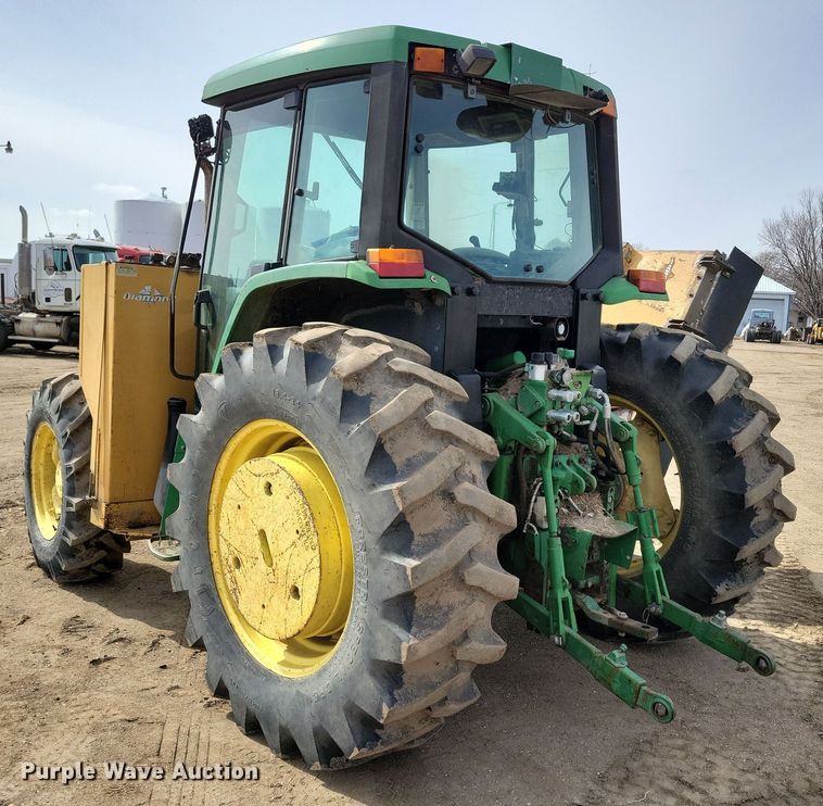 image for item DN3703 1999 John Deere  6210 MFWD tractor