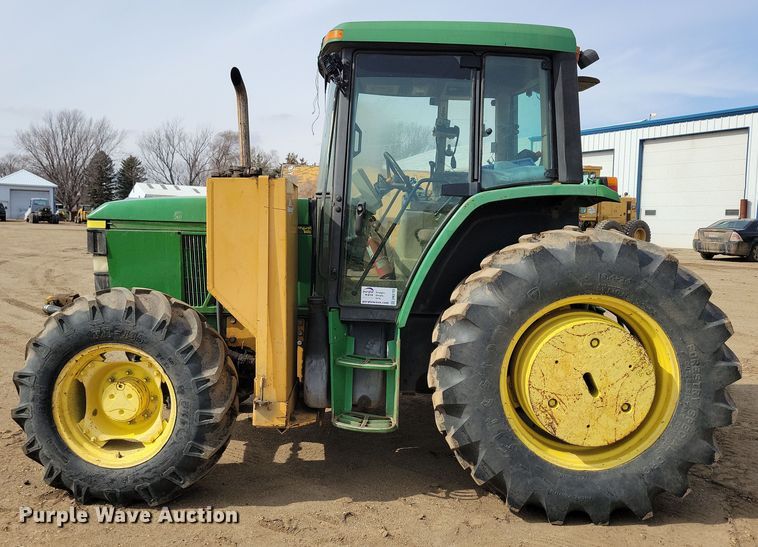 image for item DN3703 1999 John Deere  6210 MFWD tractor