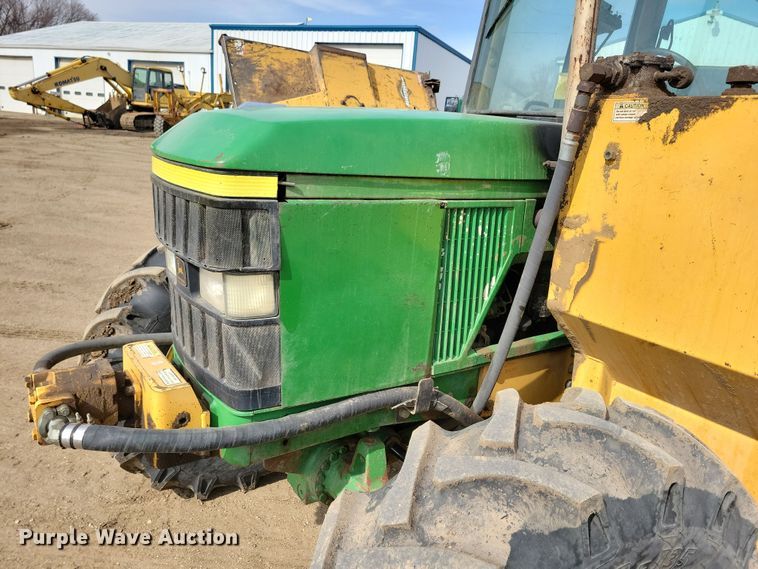 image for item DN3703 1999 John Deere  6210 MFWD tractor