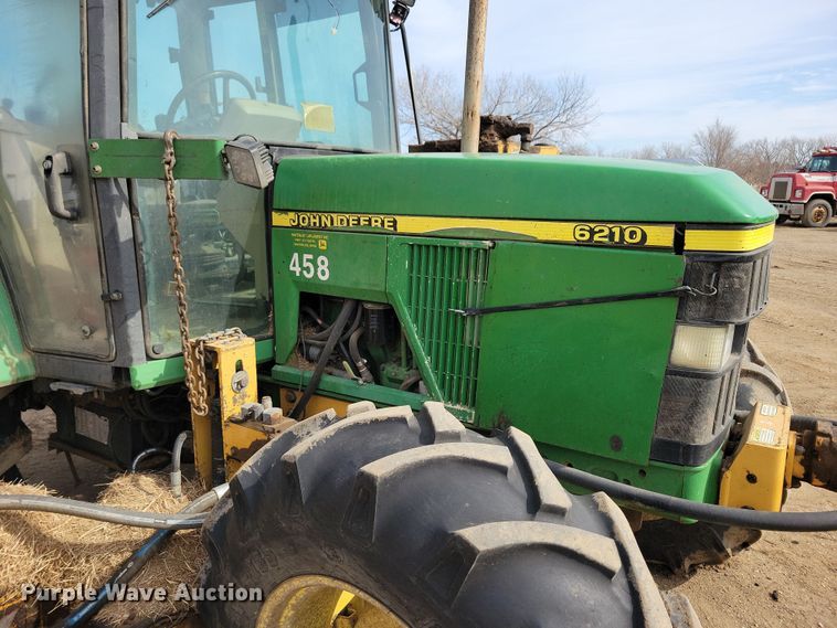 image for item DN3703 1999 John Deere  6210 MFWD tractor