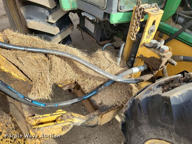 image for item DN3703 1999 John Deere  6210 MFWD tractor