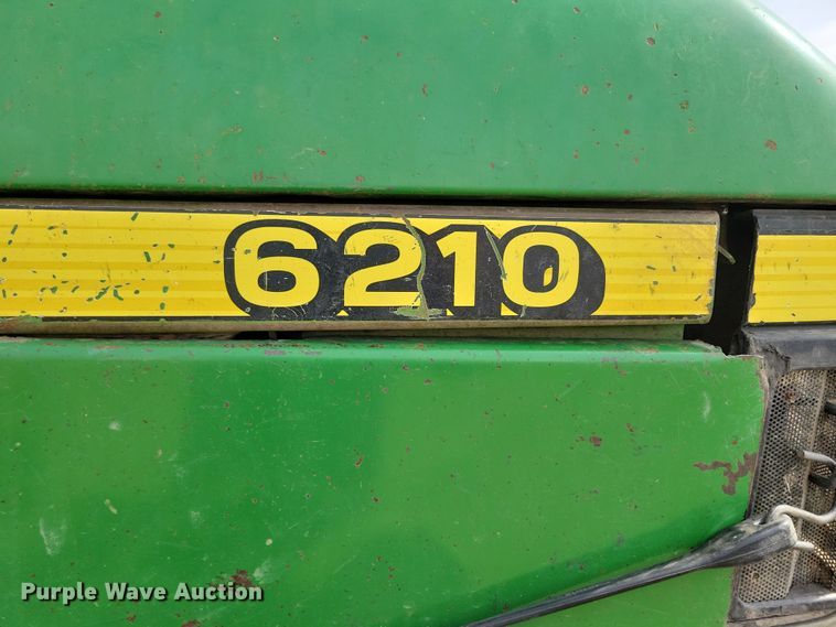 image for item DN3703 1999 John Deere  6210 MFWD tractor