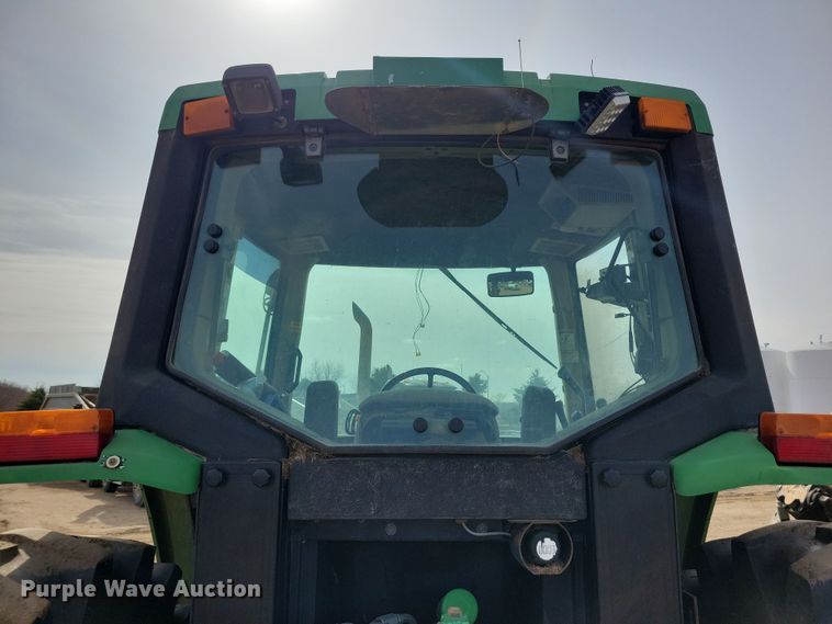 image for item DN3703 1999 John Deere  6210 MFWD tractor