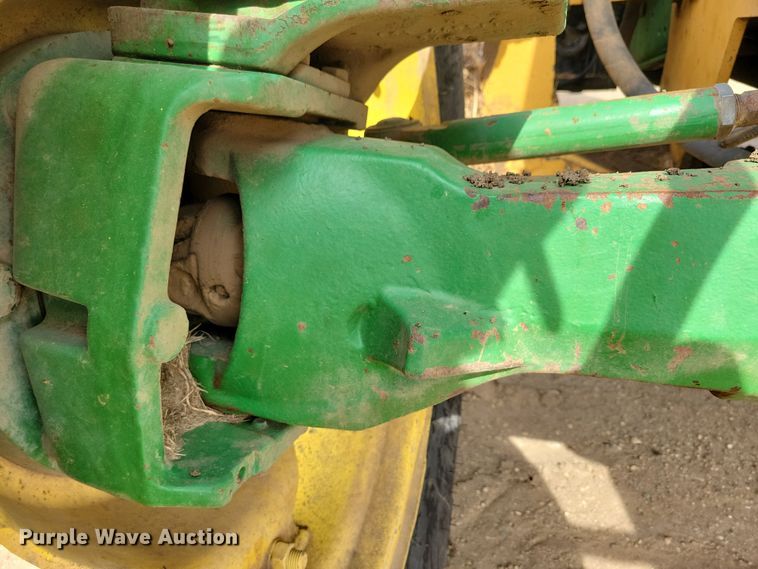 image for item DN3703 1999 John Deere  6210 MFWD tractor