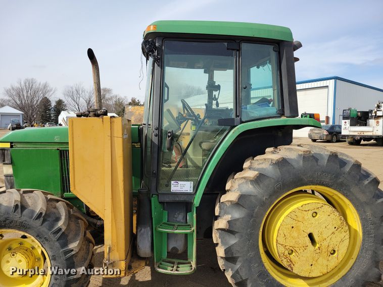 image for item DN3703 1999 John Deere  6210 MFWD tractor