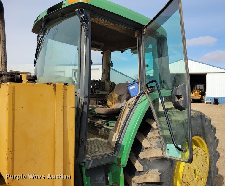 image for item DN3703 1999 John Deere  6210 MFWD tractor