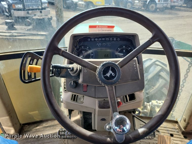 image for item DN3703 1999 John Deere  6210 MFWD tractor