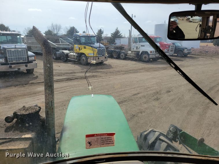 image for item DN3703 1999 John Deere  6210 MFWD tractor