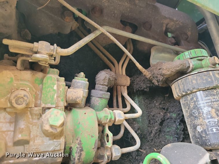 image for item DN3703 1999 John Deere  6210 MFWD tractor