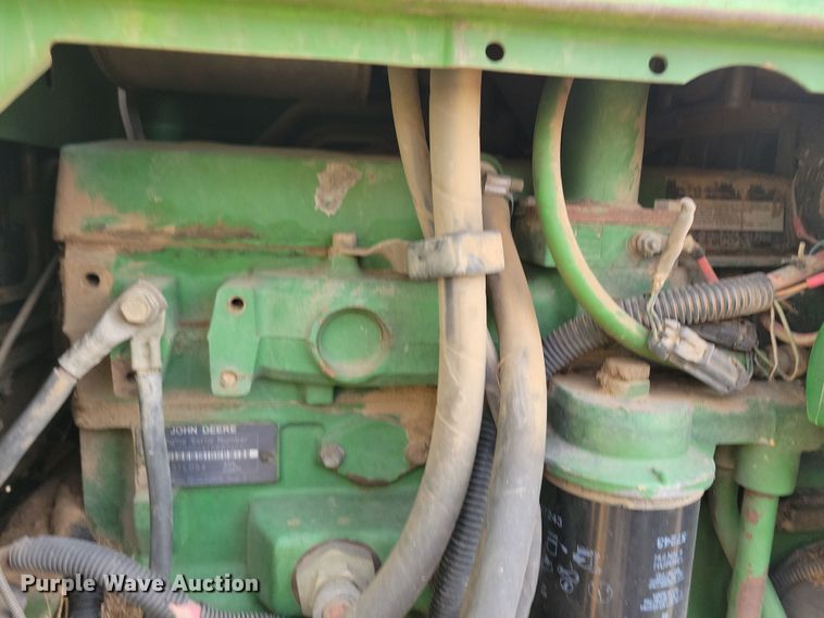 image for item DN3703 1999 John Deere  6210 MFWD tractor