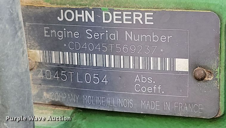 image for item DN3703 1999 John Deere  6210 MFWD tractor