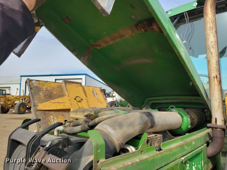 image for item DN3703 1999 John Deere  6210 MFWD tractor