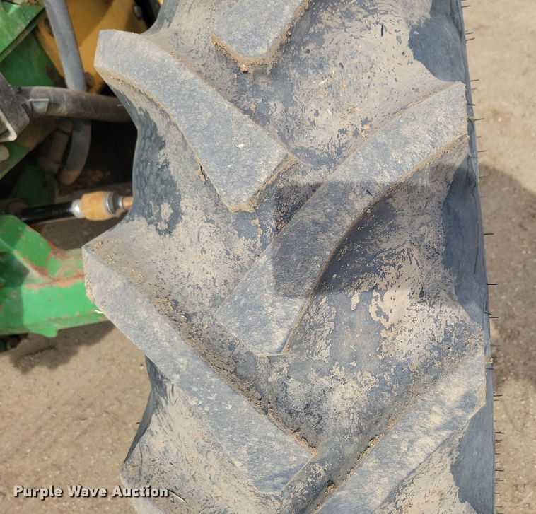 image for item DN3703 1999 John Deere  6210 MFWD tractor