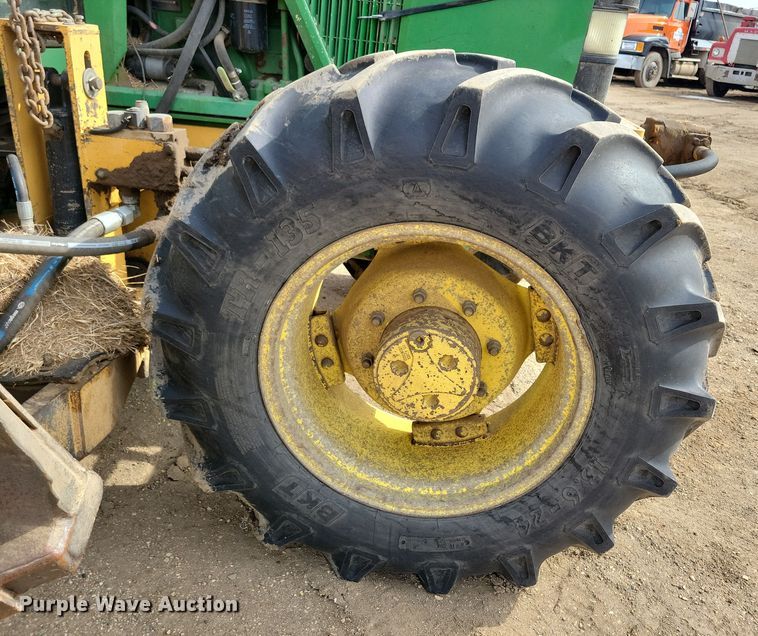 image for item DN3703 1999 John Deere  6210 MFWD tractor