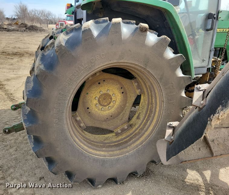 image for item DN3703 1999 John Deere  6210 MFWD tractor