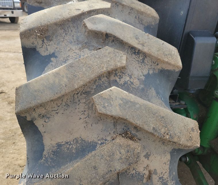 image for item DN3703 1999 John Deere  6210 MFWD tractor