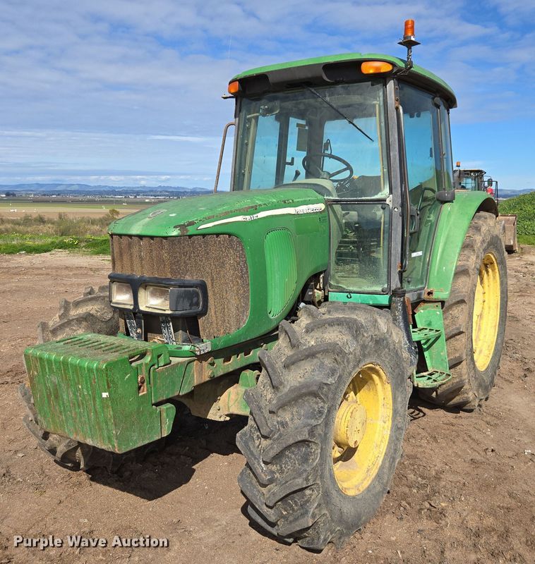 image for item EN6009 2004 John Deere 6415 MFWD tractor