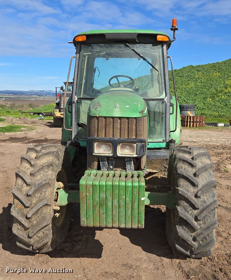 image for item EN6009 2004 John Deere 6415 MFWD tractor