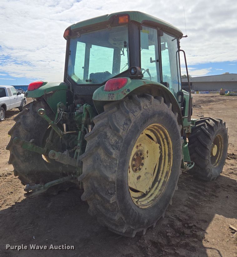 image for item EN6009 2004 John Deere 6415 MFWD tractor