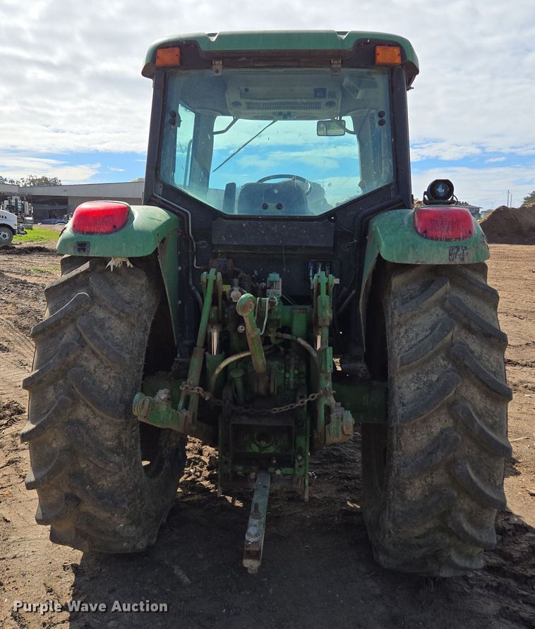 image for item EN6009 2004 John Deere 6415 MFWD tractor