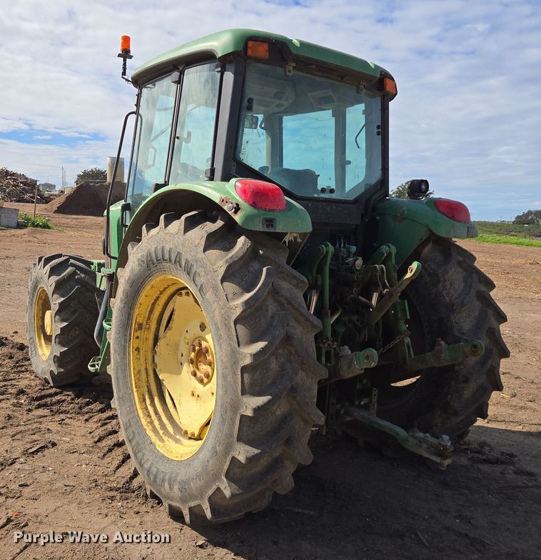 image for item EN6009 2004 John Deere 6415 MFWD tractor