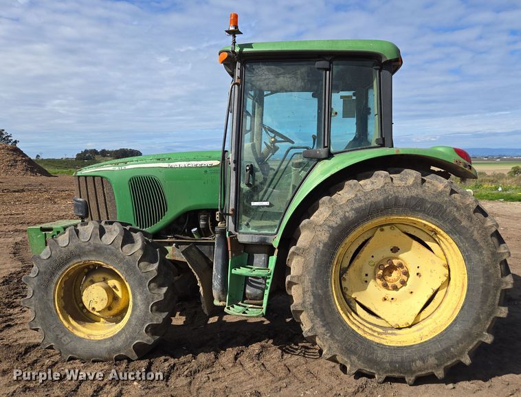 image for item EN6009 2004 John Deere 6415 MFWD tractor