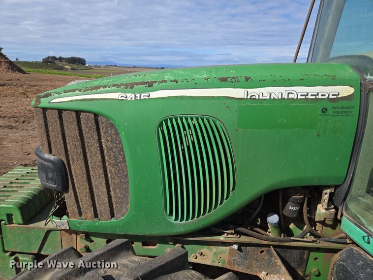 image for item EN6009 2004 John Deere 6415 MFWD tractor