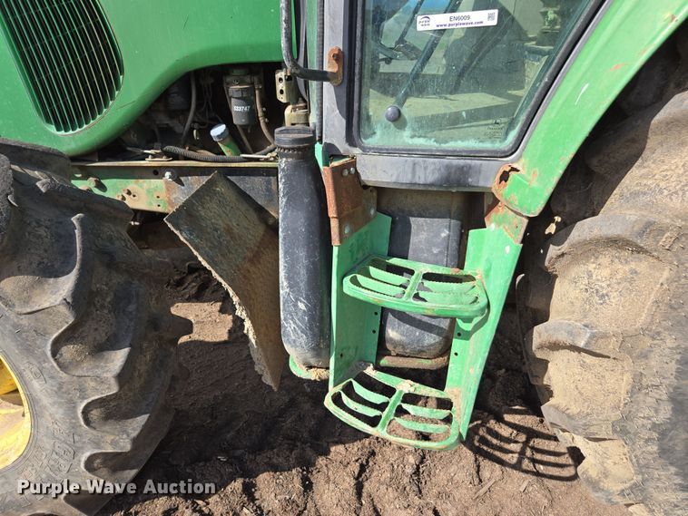 image for item EN6009 2004 John Deere 6415 MFWD tractor