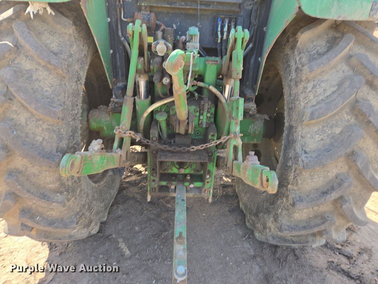 image for item EN6009 2004 John Deere 6415 MFWD tractor