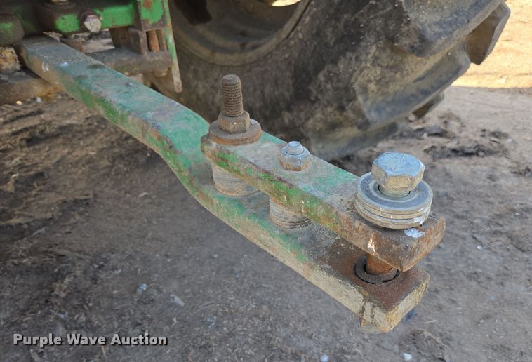 image for item EN6009 2004 John Deere 6415 MFWD tractor