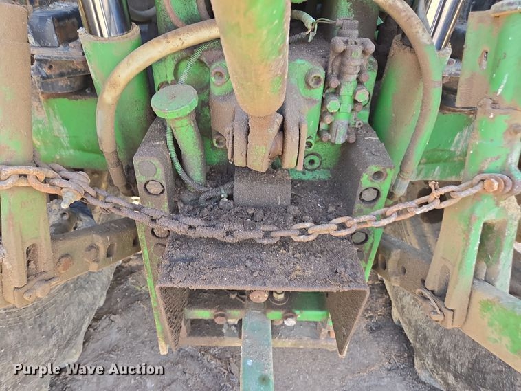 image for item EN6009 2004 John Deere 6415 MFWD tractor