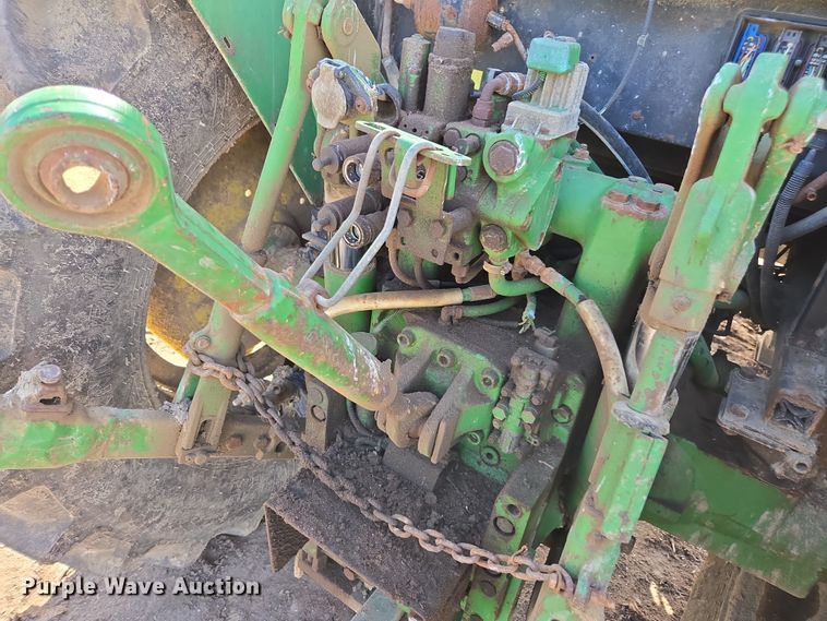 image for item EN6009 2004 John Deere 6415 MFWD tractor