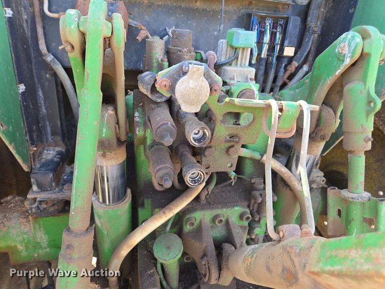 image for item EN6009 2004 John Deere 6415 MFWD tractor