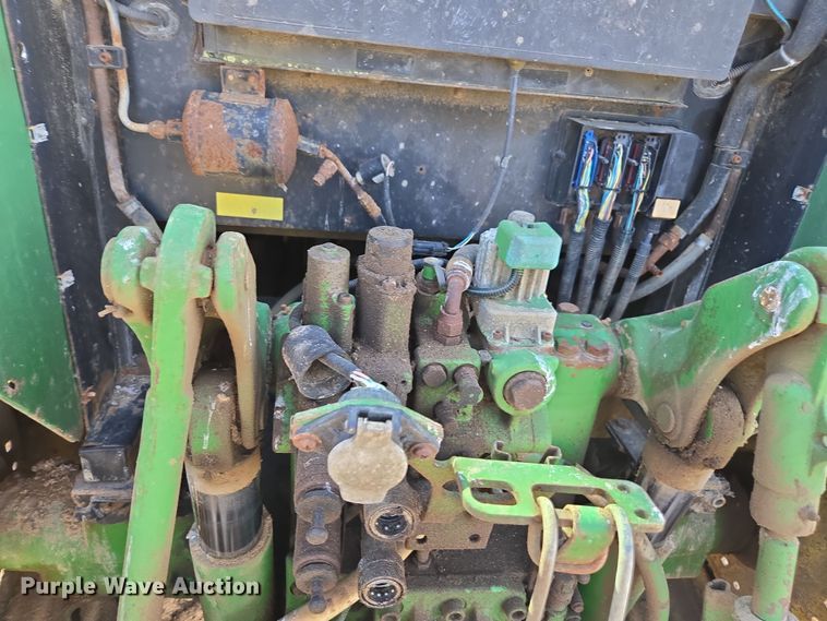 image for item EN6009 2004 John Deere 6415 MFWD tractor