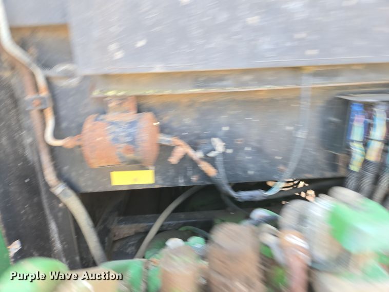 image for item EN6009 2004 John Deere 6415 MFWD tractor