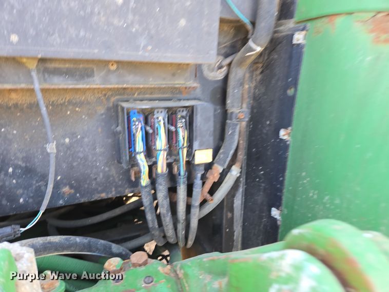 image for item EN6009 2004 John Deere 6415 MFWD tractor