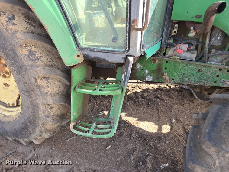 image for item EN6009 2004 John Deere 6415 MFWD tractor