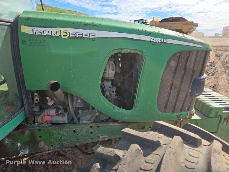 image for item EN6009 2004 John Deere 6415 MFWD tractor