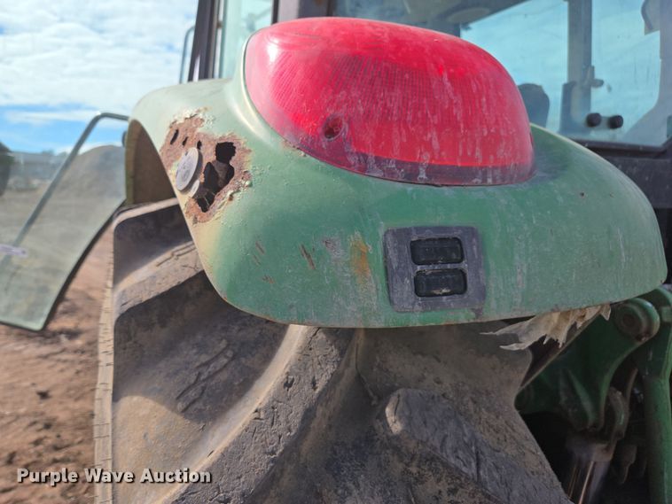 image for item EN6009 2004 John Deere 6415 MFWD tractor